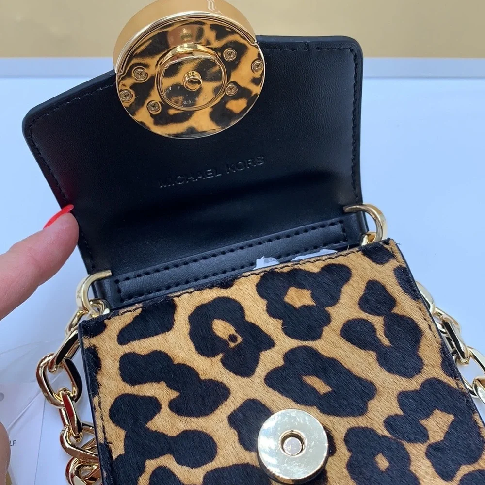 Brand New with Tag
Michael Kors Carmen Small NS Phone XBODY HairCalf
Black Multi - Picture 11 of 16